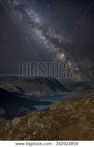 Beautiful Epic Digital Composite Landscape Of Milky Way Over Haystacks And High Stile In Lake Distri