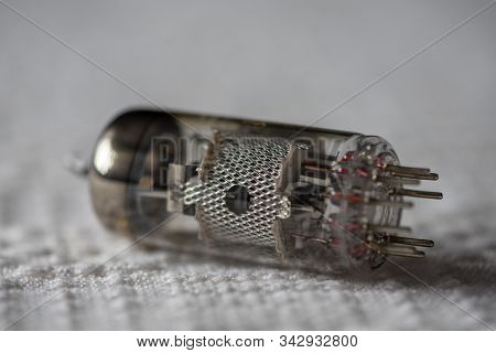 Close-up Of A Triode From An Old Tv, Laying On A White Cloth