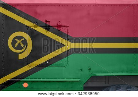 Vanuatu Flag Depicted On Side Part Of Military Armored Truck Closeup. Army Forces Conceptual Backgro