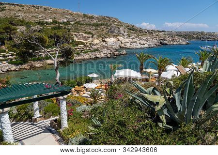 Scenic View On The Bay With Turquoise Water And The Beach Of Kalithea Springs At Greek Island Rhodes