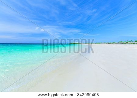 Beautiful, Gorgeous Relaxing Pretty Inviting View On White Sand Tropical Beach With Tranquil Turquoi