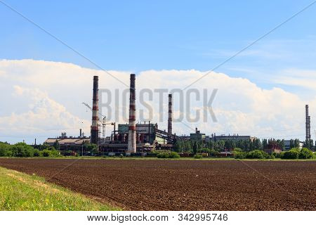 Industrial Landscape. View Of Factory In Nikopol, Dnepropetrovsk Region. Nikopol Ferroalloy Plant Is