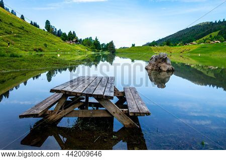 Lake Of The Confins And Mountain Landscape In La Clusaz, Haute-savoie, France