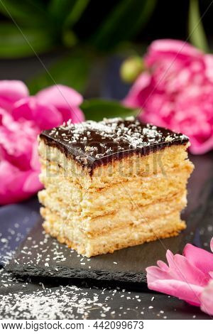 A Piece Of Heesecake On Slate Plate, Dark Background, Selective Focus