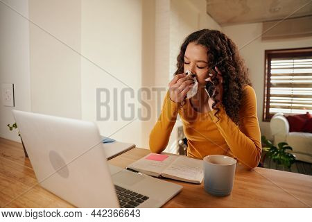 Multi-cultural Young Professional Blowing Nose While Taking Business Call. Remote Working Female Sic