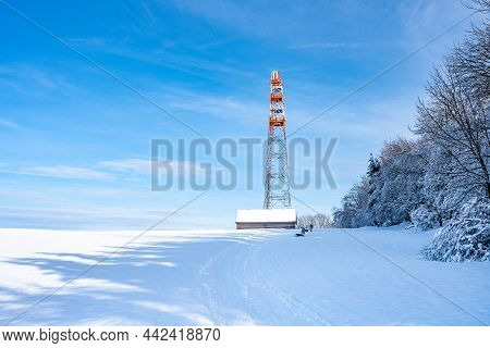 Metal Tv Transmitter In Rural Winter Landscape Covered By Snow, Kamenicky Senov, Czech Republic