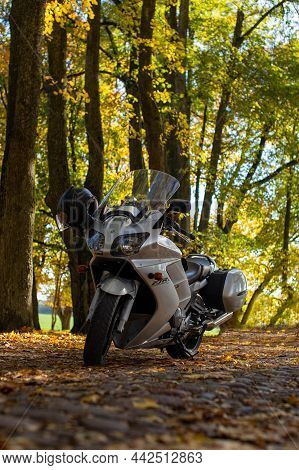 A Grey Yamaha Fjr Motorcycle Stands On A Road With Cobblestones And Yellow Autumn Foliage. Motorcycl