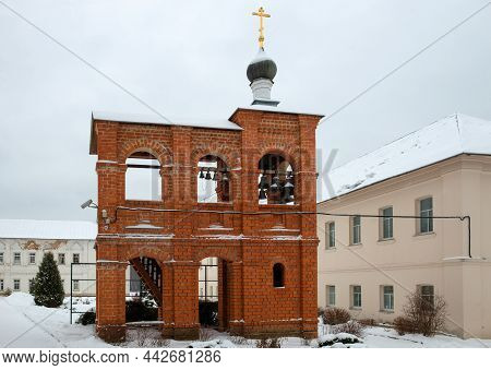 Bell Tower In The Vvedenskaya Island Hermitage On A Winter Day. Russia, Vladimir Region