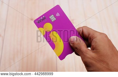 Kendal, Indonesia - 30 November 2021: Bank Jago Debit Card. Atm Bank Jago On A Wooden Background