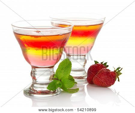 Glass with fruit jelly and strawberry