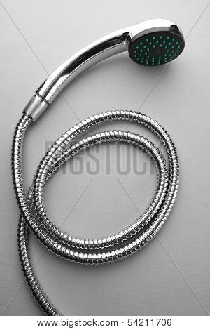 Shower on grey background 