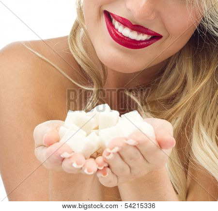 portrait of attractive  caucasian smiling woman isolated on white studio shot eating sugar