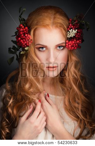 girl with mountain ash berries wreath