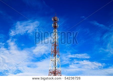Telecom Tower  And Cloudy Blue Sky