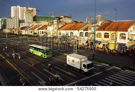 city with rows of houses and boulevard