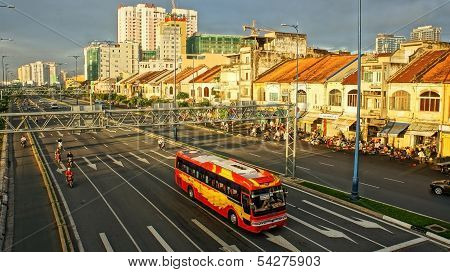 city with rows of houses and boulevard