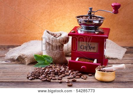 ?up of warm coffee and  grinder.
