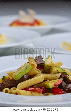 Pasta with shrimps, herbs and mashrooms isolated on white background in studio