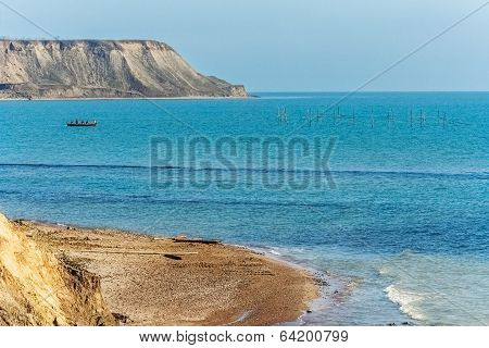 Fishermen Put Nets Into The Sea