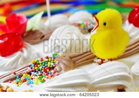 closeup of a mona de pascua, a cake eaten in Spain on Easter Monday, ornamented with a teddy chick