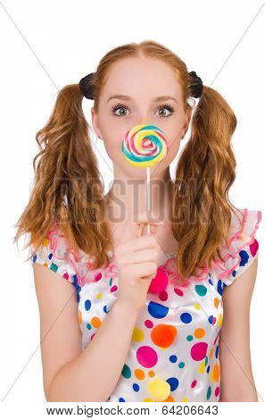 Redhead young girl with lolipops isolated on white
