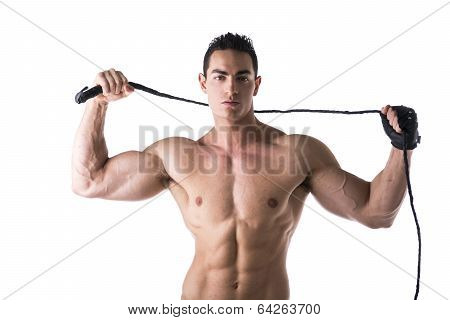 Muscular Shirtless Young Man With Whip And Studded Glove