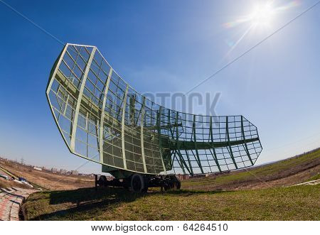 Military russian radar station against blue sky