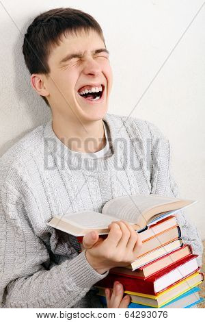 Cheerful Teenager With A Books