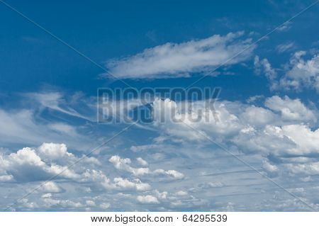 Picturesque White Clouds On A Blue Sky