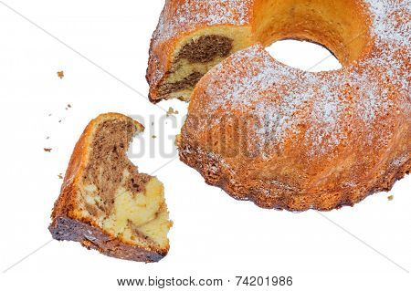 a marble cake for dessert. symbol photo for taxes, duties and shares