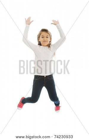 Little pretty girl jumping with joy