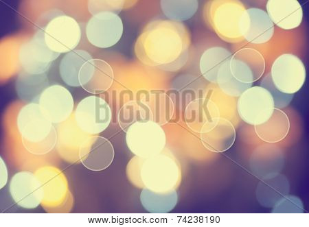 Christmas lights defocused background. Vintage styled holiday abstract bokeh