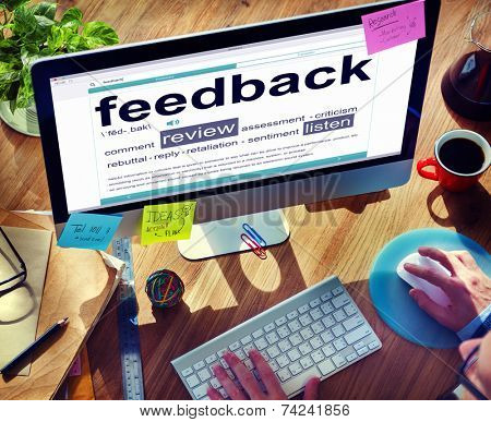 Man Reading the Definition of Feedback