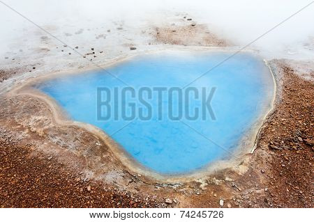 Blue pool Blesi at Haukadalur geothermal field, Iceland