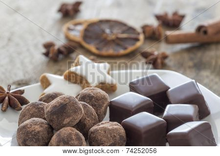 Pralines Of Chocolate And Marzipan And Cinnamon Stars