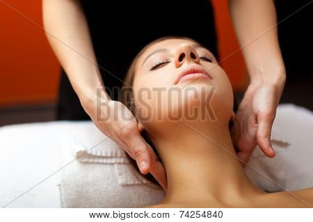 Beautiful woman having a facial massage 