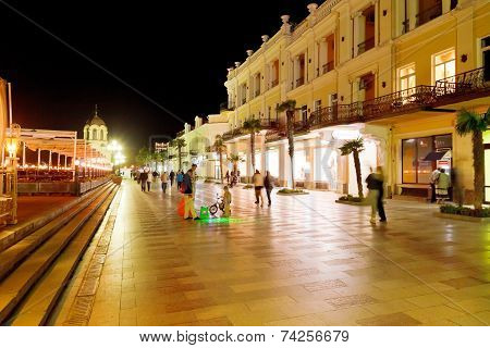 People Walking On Promenade In Yalta City In Night
