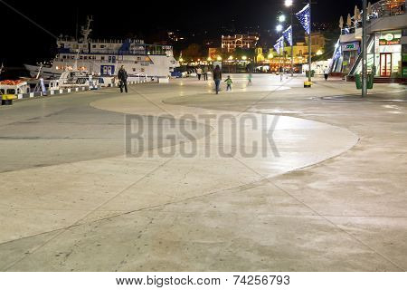 People On Waterfront In Yalta City In Night