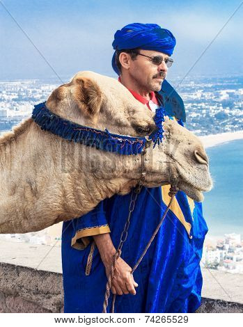 Camel driver on the mountain