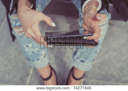 Detail Of A Girl Working With Her Tablet