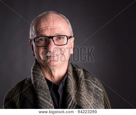 Smiling Elderly Man In Glasses