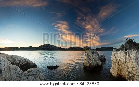purple sunrise on beach of Mediterranean Sea