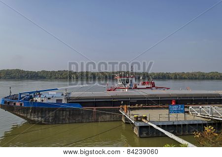 River cargo boat at pontoon in Ruse Danube port