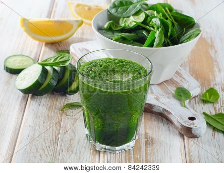 Freshly Squeezed Vegetable Juice  On A Wooden Board