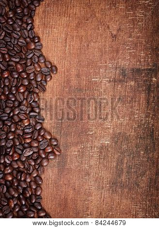 Wood Background With Coffee Beans On It