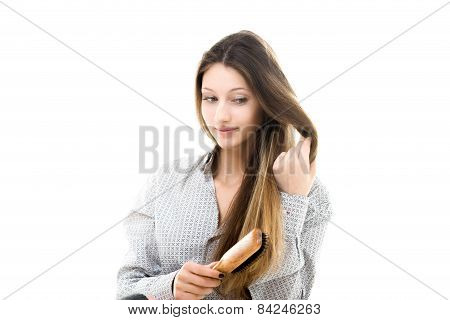 Beautiful Model Brushing Her Long Hair