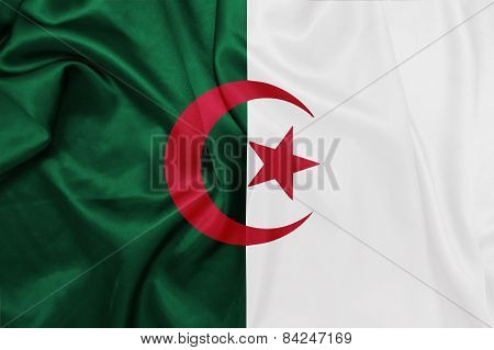 Algeria - Waving national flag on silk texture