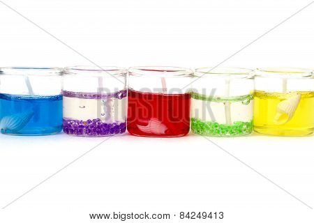 Candles In Glass Horizontally On A White Background Isolated