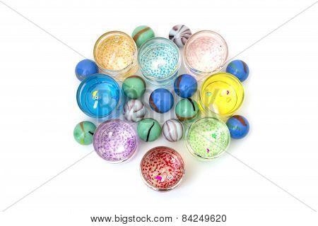 Candles In Glass With Heart Over White