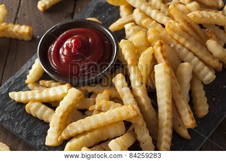 Unhealthy Baked Crinkle French Fries